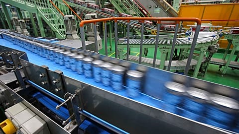 File - This 29 May 2017 photo shows the beer production line at an Asahi Breweries factory in Moriya near Tokyo.