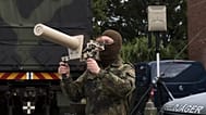 A Germany soldier presents the Counter UAV Jammer HP 47 on the second day of Bundeswehr exercises in Hamburg, 26 September, 2025