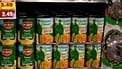 Cans of corn are shown on display in the produce section of the Table Mesa King Soopers store in Boulder, 8 February, 2022