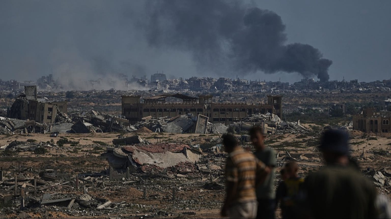 Smoke rises to the sky following an Israeli military strike in Gaza City, as seen from the central Gaza Strip, Thursday, Oct. 2, 2025