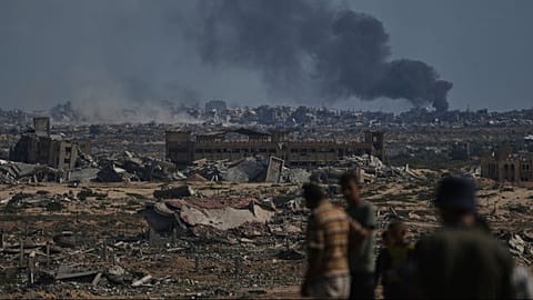 Smoke rises to the sky following an Israeli military strike in Gaza City, as seen from the central Gaza Strip, Thursday, Oct. 2, 2025