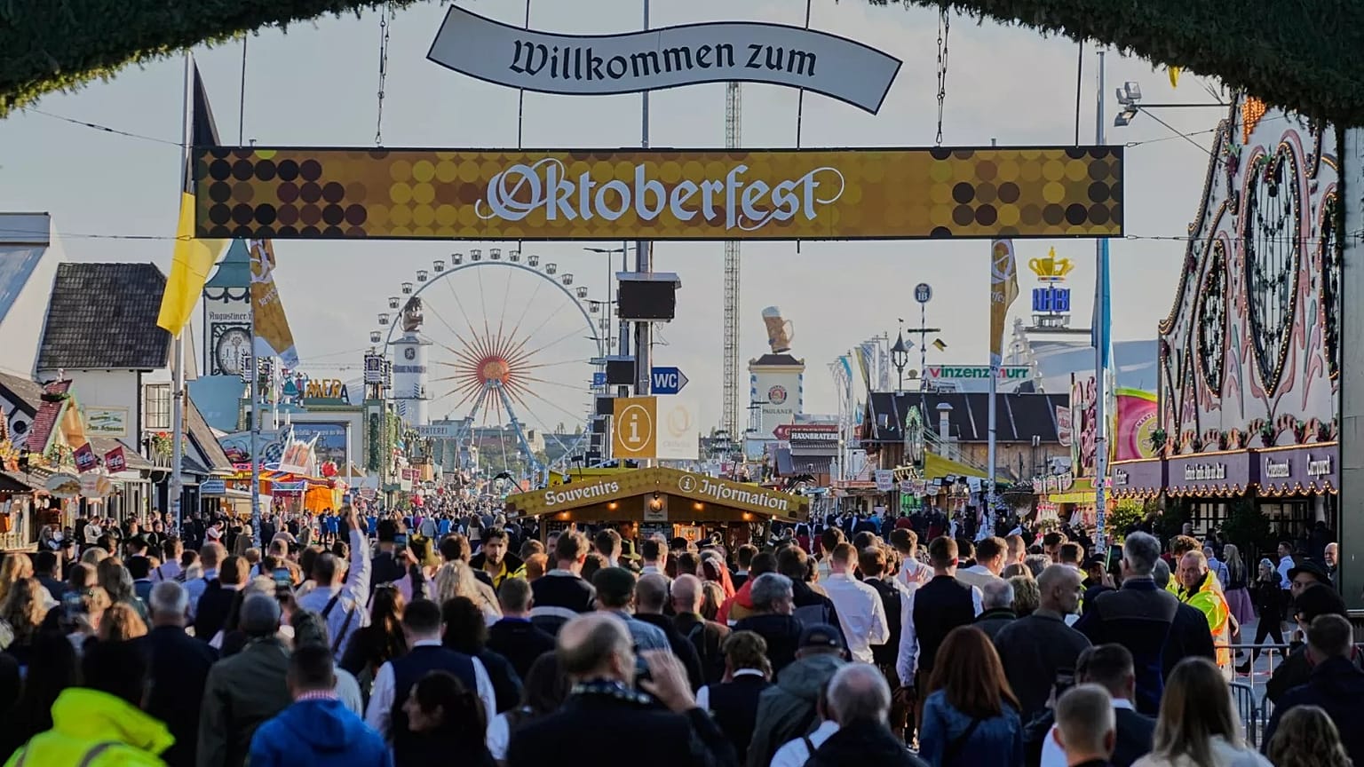 Visitors walk to the re-opening of the Oktoberfest that was closed since the morning after a bomb threatening in Munich, 1 October, 2025