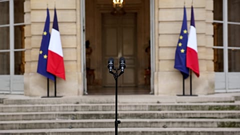 A microphone is set up in the courtyard for the statement by French outgoing Prime Minister Sebastien Lecornu at the Hotel Matignon in Paris. 6 Oct. 2025.