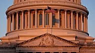 The Capitol is illuminated at dawn in Washington, Monday, Oct. 6, 2025. (AP Photo/J. Scott Applewhite)