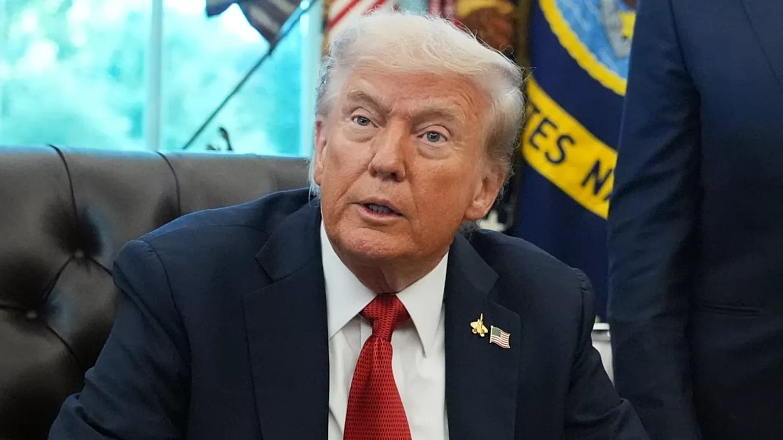 President Donald Trump speaks to reporters before signing an executive order in the Oval Office at the White House, Monday, Oct. 6, 2025, in Washington.