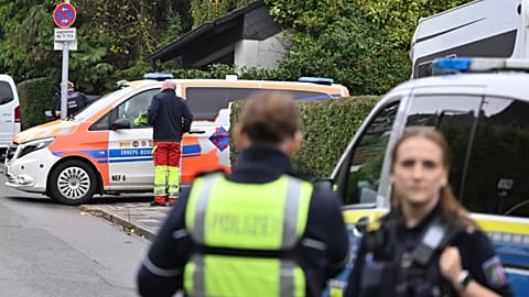 Police and emergency services stand on a street in Herdecke, 7 October, 2025
