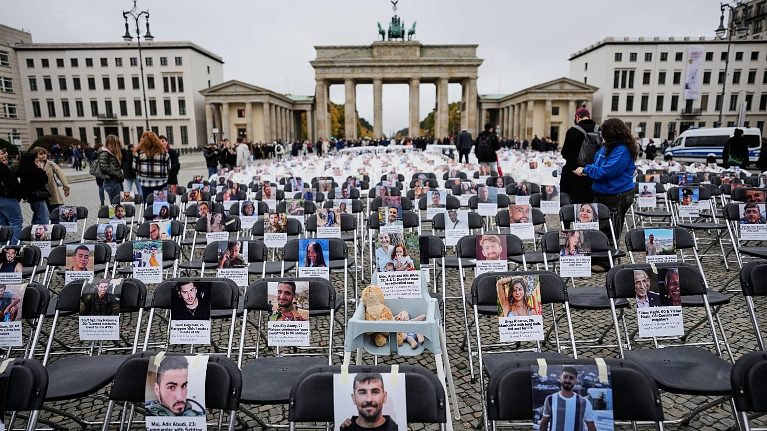 More than 1,000 chairs with photos of the murdered victims are set up in Berlin to commemorate the second anniversary of Hamas' terrorist attack on Israel. (AP Photo)