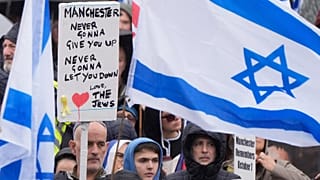 People attend a protest outside Manchester Cathedral following an attack at Heaton Park Hebrew Congregation synagogue in Crumpsall, 5 October, 2025