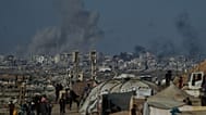 يتصاعد الدخان إثر غارة عسكرية إسرائيلية على مدينة غزة كما شوهدت من وسط قطاع غزة، الأربعاء 8 أكتوبر 2025 