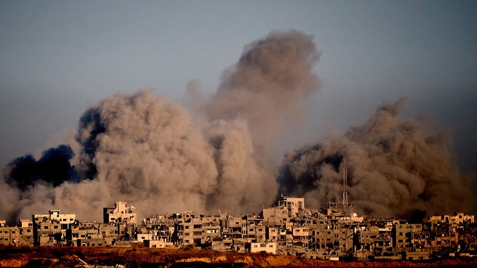 Smoke rises following an Israeli military strike in the northern Gaza Strip, seen from southern Israel, Wednesday, Oct. 8, 2025