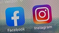 This file photo shows the mobile phone app logos for Facebook and Instagram on Oct. 5, 2021. 