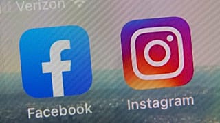 This file photo shows the mobile phone app logos for Facebook and Instagram on Oct. 5, 2021. 