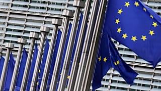 FILE: European flags flap in the wind outside EU headquarters in Brussels, 3 September 2025