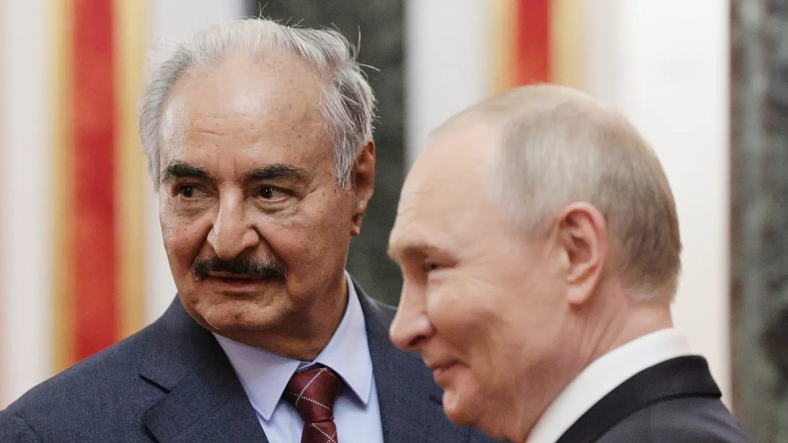 Russian President Vladimir Putin, right, and Libyan National Army Commander Khalifa Haftar meet at the Kremlin in Moscow, Russia, Saturday, May 10, 2025.