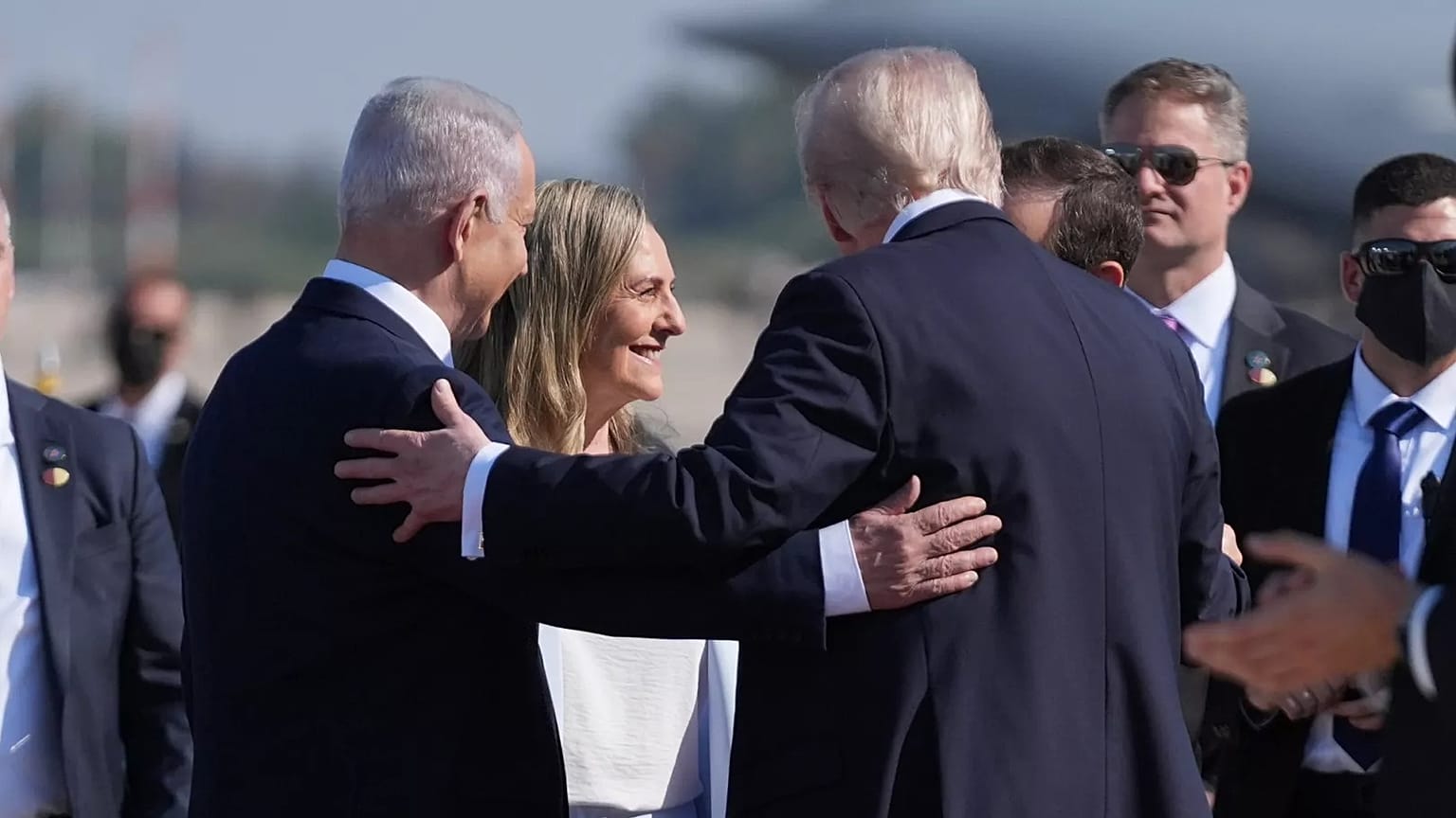 President Donald Trump greets Israel's Prime Minister Benjamin Netanyahu, as he arrives at Ben Gurion International Airport, Monday, Oct. 13, 2025, near Tel Aviv.