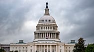 The Capitol is seen under gray skies on the thirteenth day of the government shutdown, in Washington. 13 Oct. 2025.