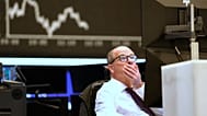 File - A trader sits on the trading floor of the Frankfurt Stock Exchange, Germany, Wednesday, 9 April 2025.