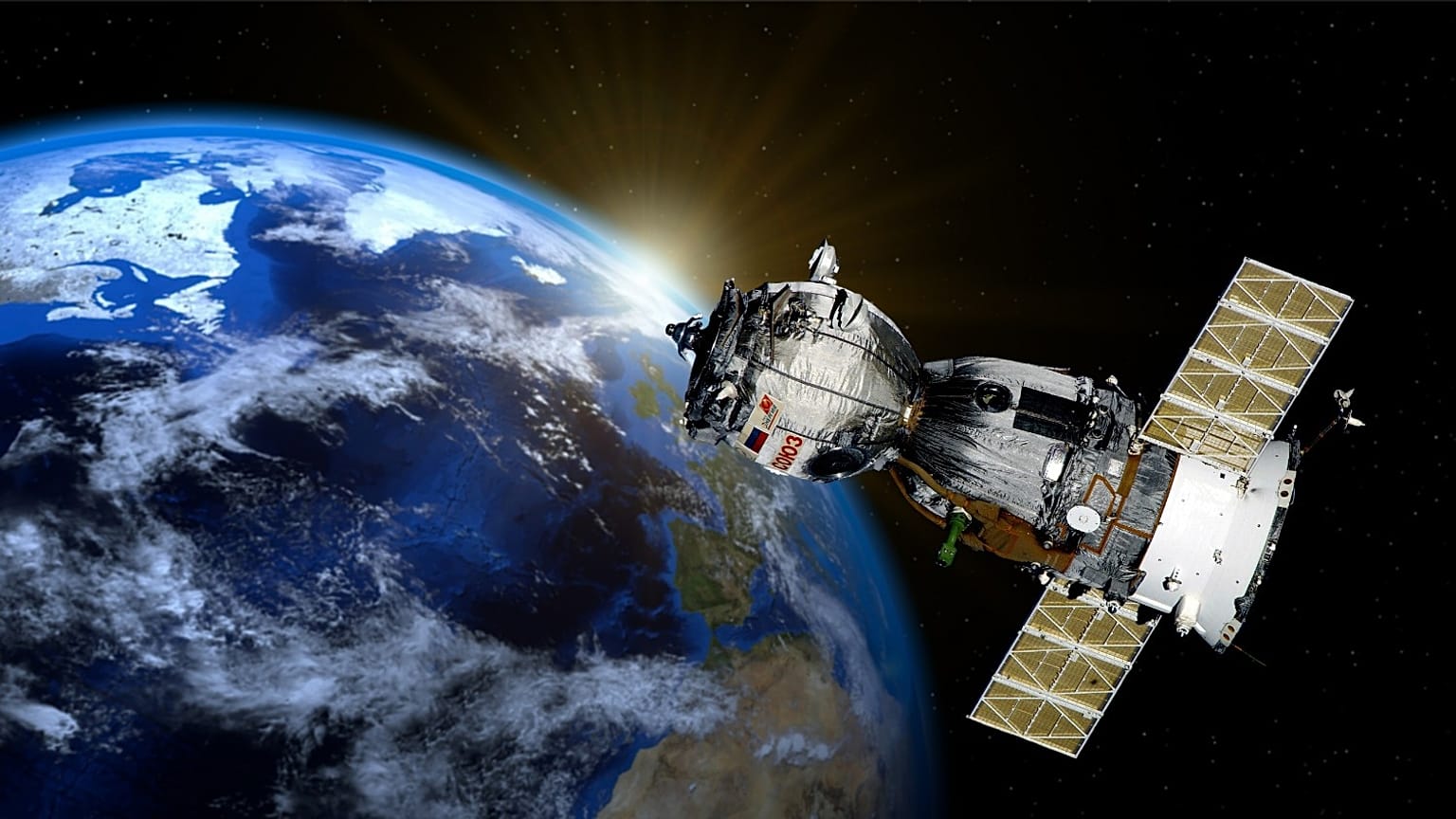 A satellite hovers above the Earth