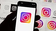 The Instagram logo is seen on a cell phone in Boston on Oct. 14, 2022.