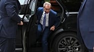 Britain's Reform UK leader Nigel Farage arrives at Southwark Crown Court in London, 14 October 2025