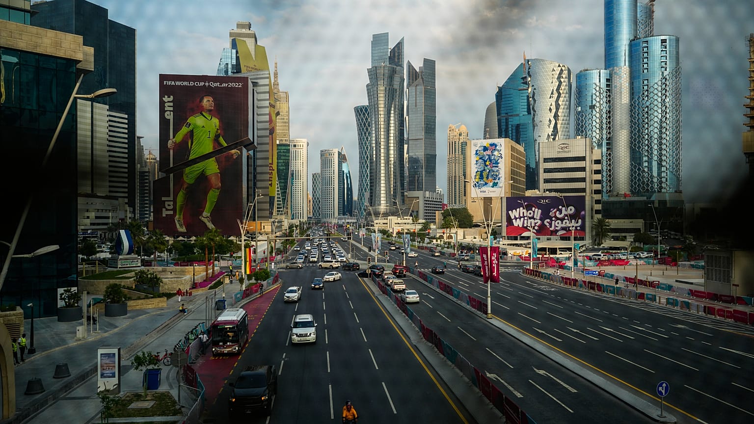 A German goalkeeper Manuel Neuer's portrait is seen on a building trough a window of a bridge over a street in Doha, Qatar. 7 Dec. 2022.