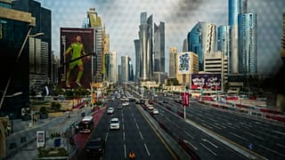 A German goalkeeper Manuel Neuer's portrait is seen on a building trough a window of a bridge over a street in Doha, Qatar. 7 Dec. 2022.