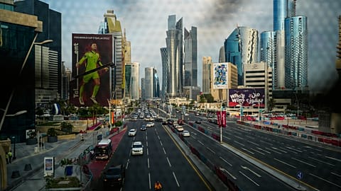 A German goalkeeper Manuel Neuer's portrait is seen on a building trough a window of a bridge over a street in Doha, Qatar. 7 Dec. 2022.