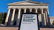 FILE - A sign that reads "Closed due to federal government shutdown," is seen outside of the National Gallery of Art in Washington, Oct. 6, 2025. (AP Photo/Jose Luis Magana, F