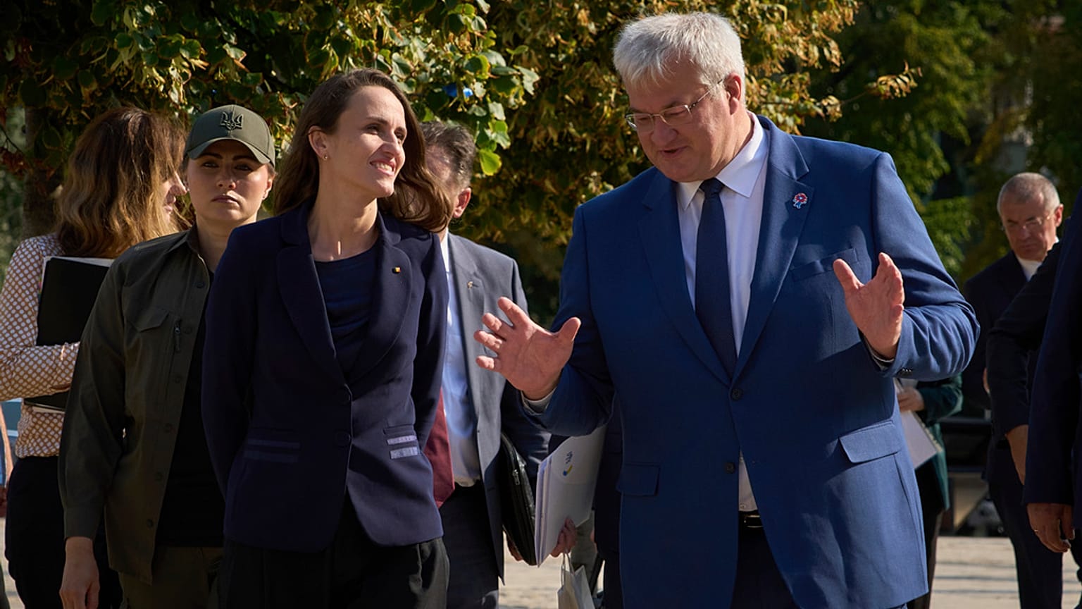 Romanian Foreign Minister Oana Toiu, left, and Ukrainian Foreign Minister Andrii Sybiha talk during their meeting in Kyiv, Ukraine, Thursday, Aug. 7, 2025.