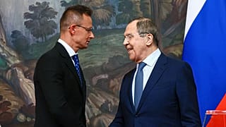 In this handout photo released by Russian Foreign Ministry Press Service, Russian Foreign Minister Sergey Lavrov, right, and Hungary's Minister of Foreign Affairs and Trade Pe