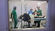 Medical staff operate on a woman at a clinic run by Doctors Without Borders in the Tabarre neighbourhood of Port-au-Prince, 8 May, 2025