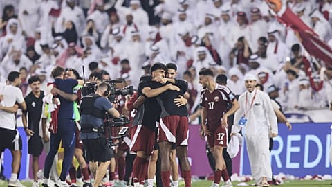 Qatar players celebrate their win against United Arab Emirates in the 2026 World Cup qualifiers at the Jassim Stadium in Doha, Tuesday, Oct. 14, 2025. t the Hamad B