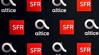 File - The logos of SFR and Alice is pictured at their headquarters in Paris, Tuesday, 20 March 2018. 