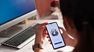 A person uses a Microsoft app.