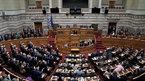 Lawmakers applaud Greek Prime Minister Kyriakos Mitsotakis during his speech in parliament in Athens, 5 March, 2025