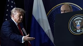 US President Donald Trump and Russia's President Vladimir Putin arrive for a press conference at Joint Base Elmendorf-Richardson in Alaska, 15 August, 2025