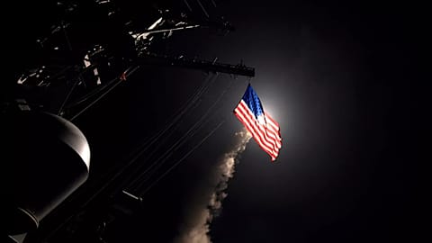 The guided-missile destroyer USS Porter (DDG 78) launches a tomahawk land attack missile in the Mediterranean Sea, 7 April, 2017
