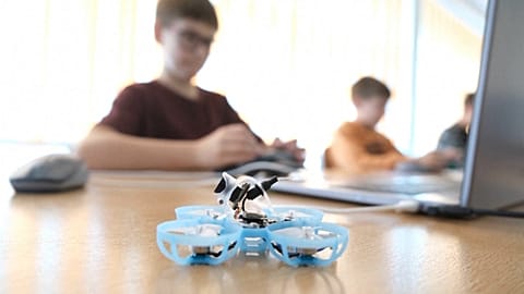 In Lithuania, young students learn how to fly small drones in an after-school programme, Kėdainiai, Lithuania. 19, Sept. 2025.