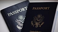 US passports are arranged for a photograph in Tigard, Ore., Dec. 11, 2021.