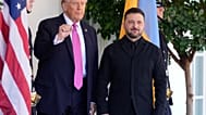 President Donald Trump, left, gestures as he greets Ukraine's President Volodymyr Zelenskyy at the White House, Friday, Oct. 17, 2025, in Washington.