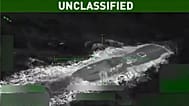 Video of alleged US strike on drug-carrying submarine in Caribbean.