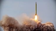 A missile is launched in a drill in Iran