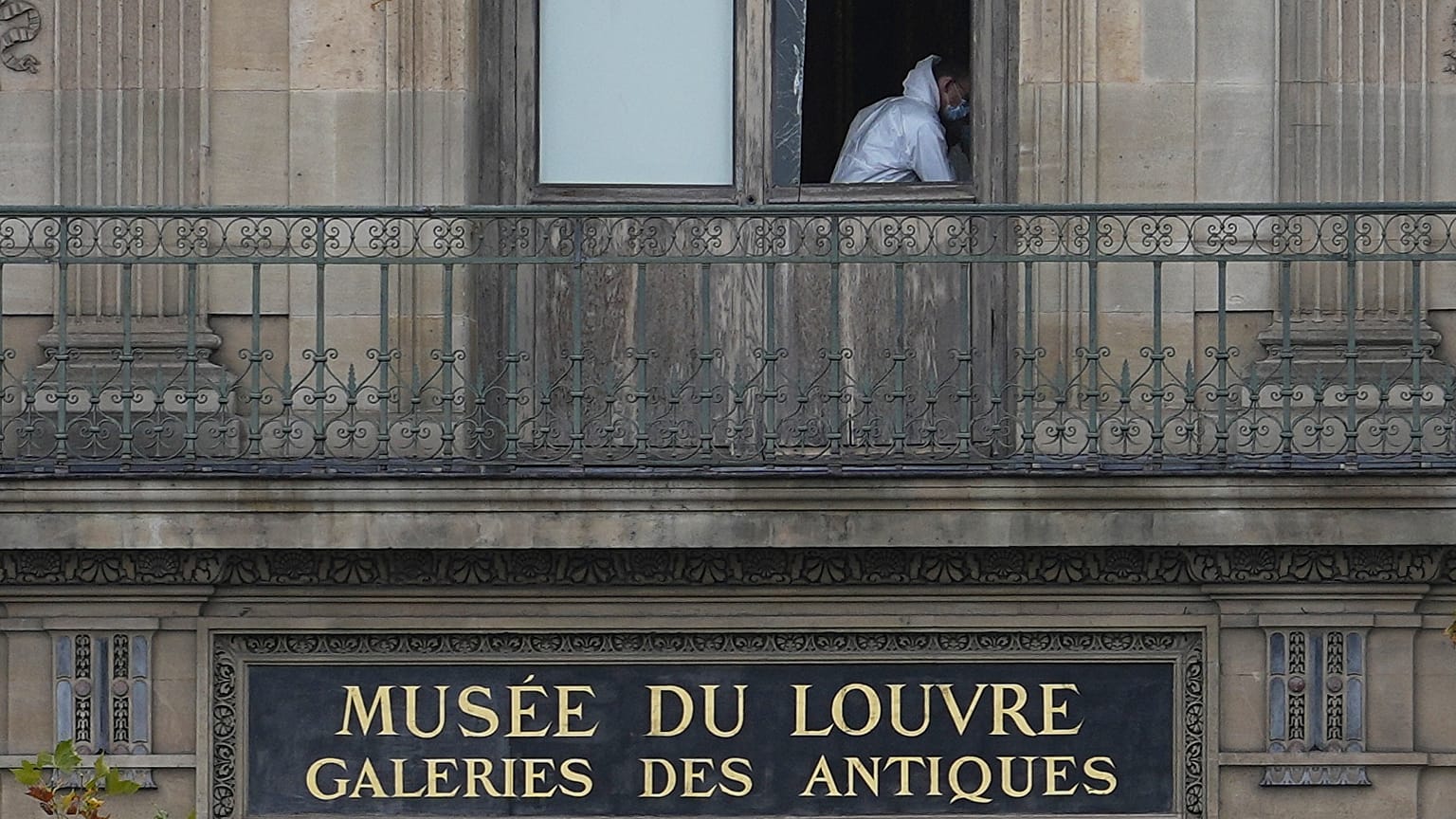 A police officer works inside the Louvre museum, Sunday, Oct. 19, 2025 in Paris. 