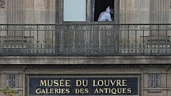 A police officer works inside the Louvre museum, Sunday, Oct. 19, 2025 in Paris. 