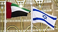 ترفرف أعلام الإمارات وإسرائيل فوق رأس الرئيس الإسرائيلي إسحاق هرتسوغ أثناء إلقائه خطابًا في معرض إكسبو 2020 بدبي، الإمارات العربية المتحدة، 31 يناير 2022.