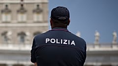 Italian police officer stands in Rome, 10 July 2016