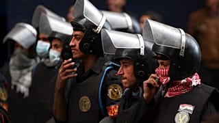 صورة تعبيرية لشرطة مكافحة الشغب المصرية، قرب ميدان التحرير في القاهرة، مصر، الأربعاء 30 يناير/كانون الثاني 2013. 