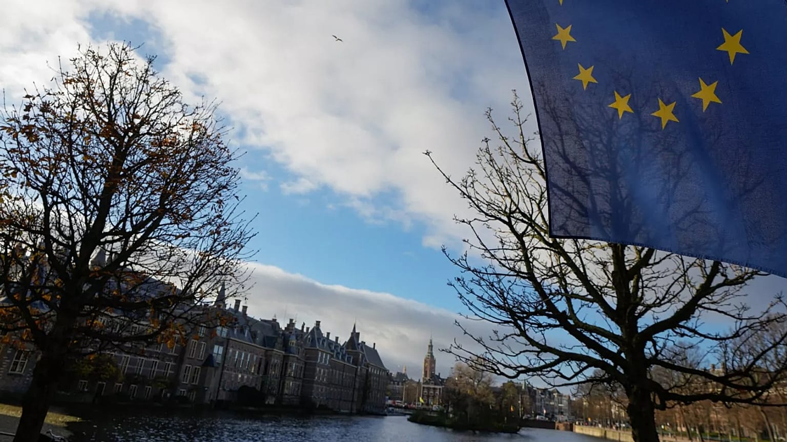 FILE: A European Union flag flies outside parliament building in The Hague, 23 November 2023