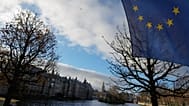 FILE: A European Union flag flies outside parliament building in The Hague, 23 November 2023