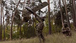 Ukrainian soldiers prepare to launch an Avenger UAV drone in Ukraine's Kharkiv region, 24 Sept., 2025.